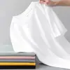 Camiseta de verano para hombre camiseta de manga corta suelta de manga media ropa para hombre joven camiseta interior de color liso