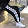 Calças casuais para meninos 2024 verão estilo de Hong Kong cityboy moda simples calças de amarração de pés calças soltas de marca da moda