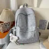 Mochila de dibujos animados estilo coreano con tacto de calidad, gran capacidad, diseño moderno, adecuada para ir al trabajo, mochila escolar ligera para estudiantes de secundaria y preparatoria.