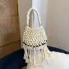Bolso de Mano de Moda y Versátil Transfronterizo para Mujer 2026 Nuevo Verano Casual Vacaciones en la Playa Bolso Cubo Calado