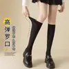Nuevos calcetines de compresión para otoño e invierno calcetines para pantorrilla mujer delgados color liso calcetines hasta la rodilla con zapatos pequeños de cuero tubo largo calcetines jk fabricantes