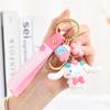 Llavero con diseño de flor de cerezo y diario de Sanrio, con diseño de explosiones, para bolso escolar, llavero de coche, venta al por mayor, joyería pequeña