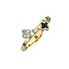 Pulseira Dupla de Trevo de Quatro Folhas Preto e Branco Aço Titânio Micro-Incravada com Diamante Banhada a Ouro Ouro Rosa Concha Pulseira Aberta para Mulheres