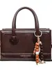 Bolso tipo baguette elegante de diseño de nicho para mujer 2025 Nuevo modelo de invierno Bolso de hombro cruzado diario de retazos de lujo ligero