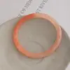 Pulsera de Anillo Lisa Pequeña Acrílica Vintage, Estilo Minimalista con un Toque de Lujo, Aretes de Nuevo Estilo Chino, Joyería de Mano Elegante