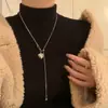 Cadena de suéter con borla de corazón plateado estilo coreano, collar simple y exquisito, collar de diseño de nicho para mujer, cadena para la clavícula