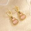 Olho de gato rosa Pedra cabaça orelha fivela bonito diamante luz luxo brincos high-end mulheres novos brincos chineses para a primavera e verão