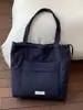 2026 Nuevo Bolso de Hombro Versátil de Gran Capacidad para Invierno Bolso Tote Simple y Elegante Bolso de Clase para Estudiantes Universitarios Bolso de Moda para Mujer