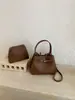 Bolsa de mão de alta qualidade transfronteiriça para mulheres, nova moda bolsa tipo balde simples, bolsa de ombro e transversal casual para o dia a dia, moderna