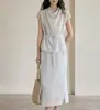 Vestido conjunto elegante estilo francês de acetato tencel, com top ombro a ombro e cintura de amarração, e saia de cintura alta