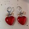 Pendientes de vórtice de amor con lazo oscuro estilo网红 femenino estilo Shibuya estilo Milenio pendientes de personalidad modernos geniales