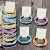 Liga de goma tarjeta de pedido versión combinada liga de goma plato coreano liga de goma elástica accesorios para el cabello anillo para el cabello embalaje de tarjeta dos yuanes productos de alta calidad y bajo precio