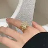Anillo Retorcido Transfronterizo con Incrustaciones de Cobre y Circonio Oro Real Múltiples Capas Retorcidas Anillo Retorcido Personalizado de Alta Gama para Mujer Lujo Ligero Venta al por Mayor