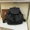 Mochila casual elegante y versátil de cuadros simple de gran capacidad, nueva moda verano 2026, alta apariencia, para comercio transfronterizo