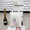 Direto da Fábrica Bolsa de Lona de Grande Capacidade Nova Bolsa de Ombro Feminina com Estampa Bolsa de Lona com Padrão de Personalidade Fofa Atacado
