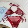 Bikini de estilo sexy de deseo puro transfronterizo con rayas rojas y blancas, favorecedor para la piel, para vacaciones en la playa, pantalón de playa de dos piezas, traje de baño para mujer
