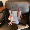 Bolso de Mano Retro de Gama Alta Tipo Cubo para Mujer 2025 Nueva Moda Bolso Cruzado Versátil Bolso de Hombro Pequeño Súper Popular