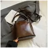 Bolso cubo transfronterizo, bolso cruzado de lujo ligero para mujer, bolso de mano de gran capacidad estilo coreano moderno, bolso de hombro de diseño de nicho retro