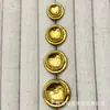Botones metálicos en forma de espiga para trajes, abrigos de punto de lana, botones decorativos simples y versátiles cosidos a mano