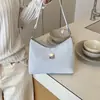 2026 Verano Nuevo Estilo Coreano Bolso de Mujer Dulce Moda Viaje Diario Bolso de Hombro Único Simple Versátil Cruzado de Mano Debajo del Brazo