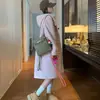 Abrigo de lana de longitud media con capucha y bolsillo de botón de cuerno rosa transfronterizo para mujer, abrigo petite estilo universitario de otoño e invierno, moderno