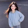 Conjunto Versátil de Dos Piezas para Niñas: Sudadera con Capucha y Cremallera de Manga Larga Estilo Universitario Nuevo y Jeans con Lazo 2026