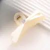 Presilha de Cabelo Elegante com Laço Preto e Branco de Tamanho Médio Estilo Francês, Toque de Luxo Leve e de Alta Qualidade, Grampo para Penteado de Coque Feminino