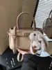 Bolsa Cruzada Femenina Nueva de Primavera 2026 Estilo Vintage de Alto Valor Bolso de Mano Casual para Viajes Bolso Cubo
