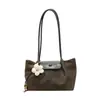 Bolso de mano casual retro de gran capacidad para mujer, nueva moda otoño 2026, bolso de hombro simple de alto valor para el día a día