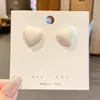 Pendientes combinables puesto de mercado nocturno al por mayor Corea del Sur pendientes explosivos simples diseño de nicho femenino pendientes de moda con temperamento