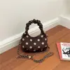 Bolso pequeño súper popular para mujer, nuevo de verano 2026, vintage, exquisito, para el trabajo, de hombro, cruzado, con cadena