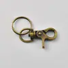 Acessórios de ferragens para bagagem gancho de corda de tração para animais de estimação grampo de liga de zinco chaveiro ferragens fivela de cachorro bronze