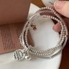 Pulsera colgante redonda de tres capas de Corea del Sur, lujo ligero, nicho, exquisito, regalo, pulsera para novia, pulsera de diseño de moda, temperamento