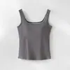 Dropshipping Verano 2026 Nuevo Estilo Color Sólido Cuello Redondo Tirante Ancho Ropa Interior Sencilla Ropa Exterior Camiseta sin Mangas con Almohadillas en el Pecho