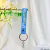 Nuevo llavero correa de goma blanda accesorio colgante para bolsa correa de cuero lindo llavero de PVC correa de goma blanda al por mayor