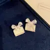 Pendientes de moda rectangulares de circonita con aguja plateada y mariposa, lujo ligero, alta gama, elegantes, únicos y hermosos pendientes para mujer