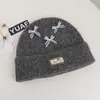 Gorro de punto estilo coreano, mezcla de lana, inspirado en la dopamina, con un lazo, diseñado para mujeres, que proporciona calidez y protección para los oídos en otoño e invierno, adecuado para estudiantes