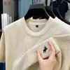 Camiseta de manga corta para hombre, nuevo estilo de verano, versátil para el uso diario, con pequeño logo bordado, jacquard completo, camiseta holgada y transpirable para hombre
