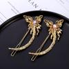 Horquilla de arco china con resorte, nueva, con retención de color, mariposa dorada, diamantes de imitación, hebilla de rana, clip de resorte para la cabeza, venta al por mayor