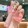 Nuevo Estilo Llavero de Flor de Cerezo Relleno de Aceite para Niñas, Lindo Colgante de Botella Flotante de Gato Kt con Arena Líquida, Decoración para Mochila Infantil