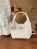 Bolso de Piel Rosa Suave de Alta Gama para Mujer 2026 Nuevo Estilo Bolso Cubo Bolso de Hombro Único Bolso Cruzado Versátil para Viajes al Trabajo Modelo de Diseño de Nicho