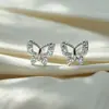Serie de Aretes de Siete Días Aretes de Mariposa Aguja de Plata 925 Aretes Versátiles para Mujer Sentido de Alta Gama Joyería para Orejas con Temperamento Artículo Popular Venta al por Mayor