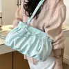 Bolso de cubo plisado elegante de mano para mujer 2026 verano nuevo bolso casual simple de un solo hombro versión coreana sensación de alta gama bolso de mujer