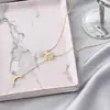 Moderna, Elegante y Encantadora Cadena Larga de Metal Creativa de Sol y Luna Estilo Banquete para Mujer