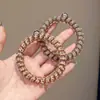 Goma para el pelo de alambre de teléfono con estampado de leopardo retro, alta elasticidad, banda de goma sin marcas para adultos, adecuada para coletas, simple y elegante, no daña el cabello