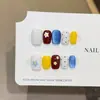 Flor Pequeña Cremosa Azul Súper Brillante Ojo de Gato Estilo Corto Uñas Portables Completamente Hechas a Mano Pegatinas de Arte para Uñas Completamente Hechas a Mano Piezas de Uñas Postizas