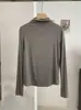 KEKEZOON Cuello semialto hombro normal corte ajustado favorecedor color liso manga larga prenda interior camiseta básica top venta al por mayor 8912