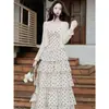 Vestido de tirantes de lunares suave estilo francés para mujer, nuevo atuendo de sesión de fotos de primavera-verano en la playa, impresionante vestido hasta el tobillo