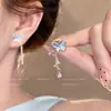 Aretes Asimétricos de Mariposa con Borla y Piedra Ojo de Gato para Mujer, Estilo Súper Hada, Diseño Único y Elegante, Aretes Impresionantes