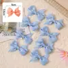 Accesorios casuales Transfronterizos europeos y americanos Accesorio para el cabello de lazo cinta acanalada de color sólido lazo pinza pequeña para el cabello para niños